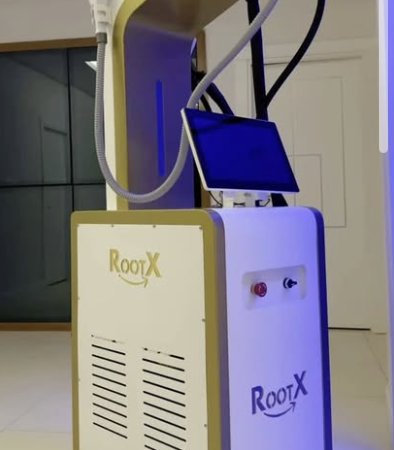 White and gold ROOTX machine